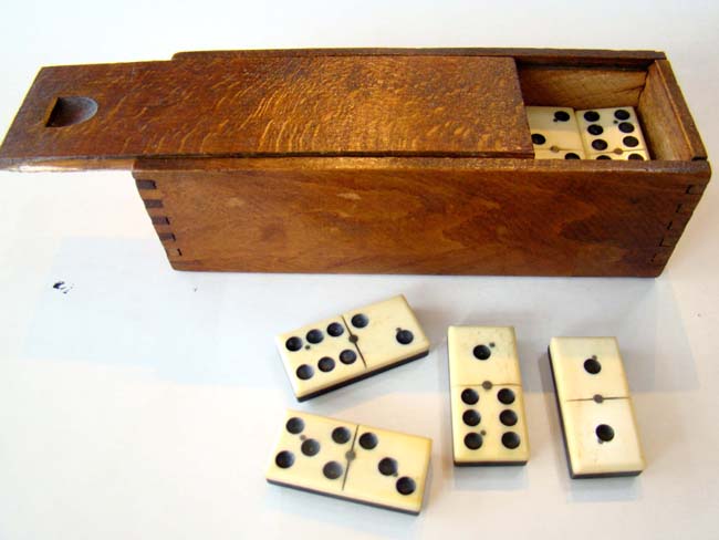 A very nice set of late 19th century bone and ebony dominoes